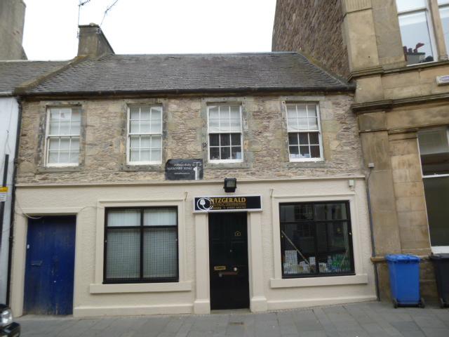 6 and 8A Wellgate, principal elevation, looking southwest, during daytime on an overcast day.