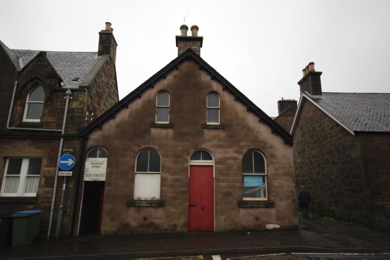 5-7 Reform Street (former Blairgowrie Printers), gable ended north elevation, looking south on overcast day with red door to centre