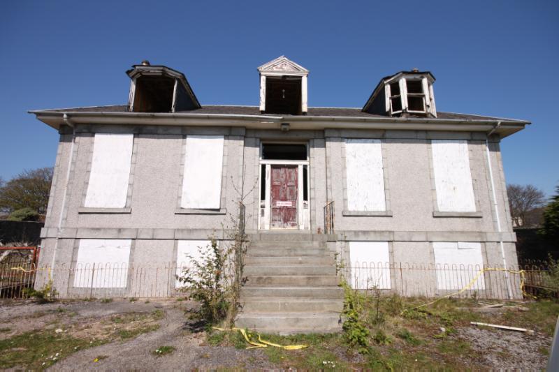 Hillside House, Portlethen, principal elevation, looking northwest, during daytime on a sunny day with blue sky.