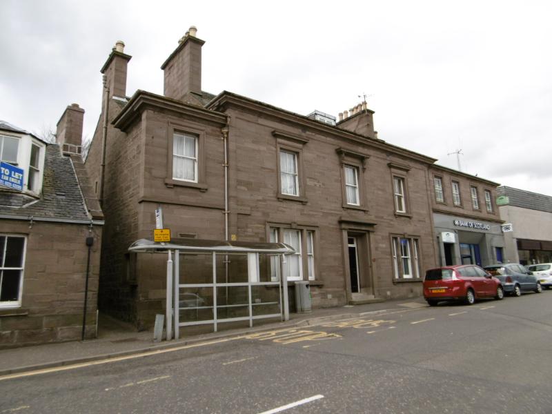 3 Clerk Street, Brechin, principal elevation looking north, during daytime, grey sky, bus shelter in foreground