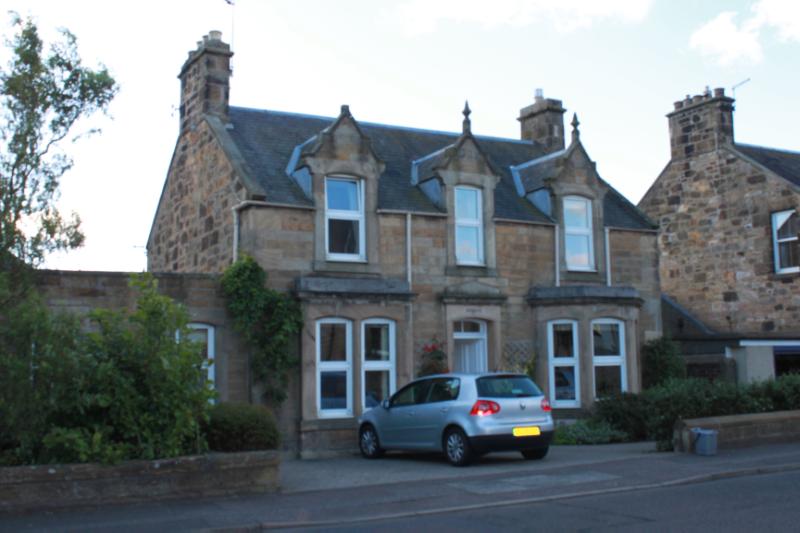 Beulah, 57 Bonnyrigg Road, principal elevation, looking south east in the early morning with low light. 