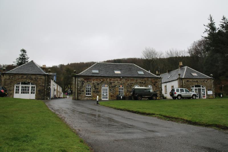 Kelburn Country Centre, view of principal elevations, looking east during rainfall with white sky