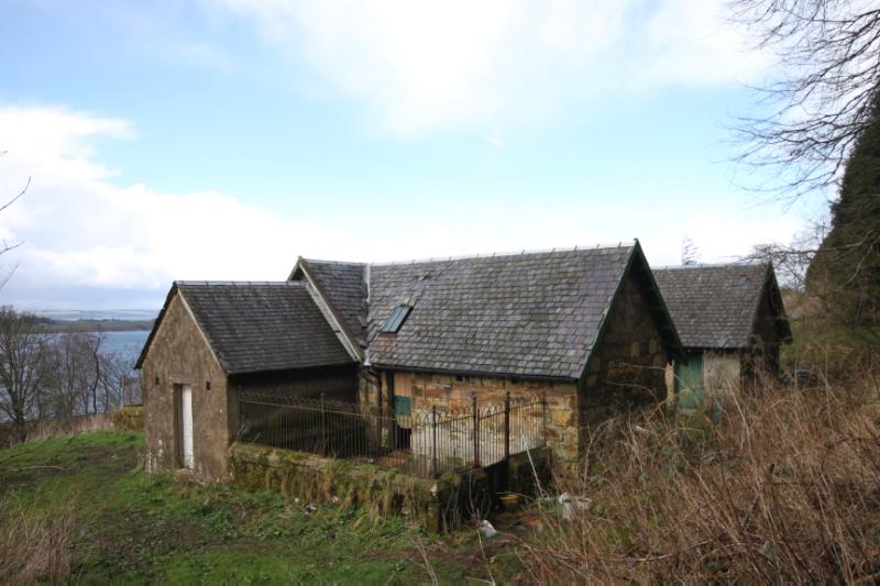 Kennels to the north of Kelburn Castle, looking northwest on a partly cloudy day