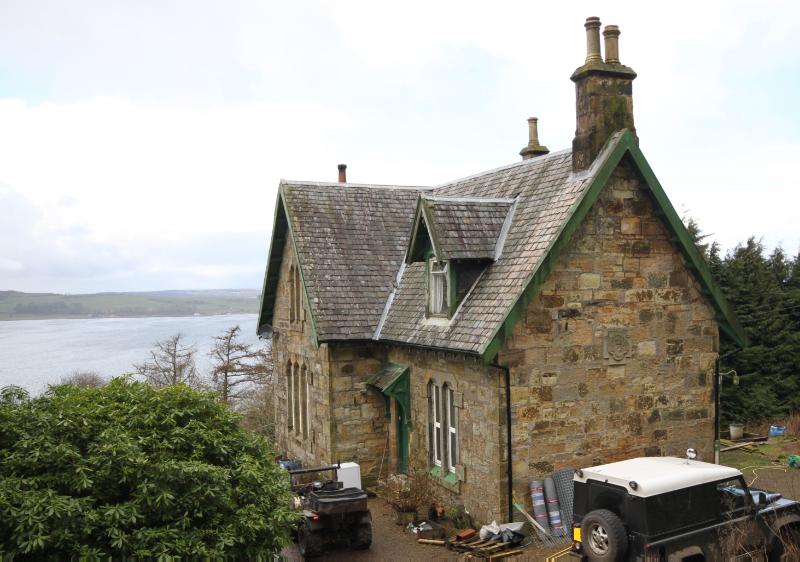 Garden House to the north of Kelburn Castle, looking southeast on a wet and cloudy day