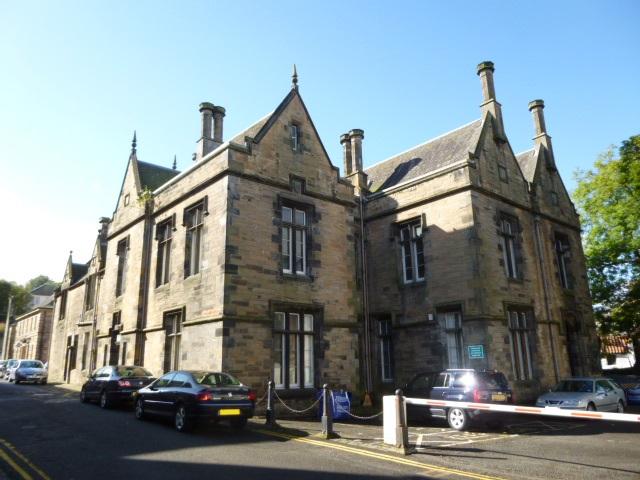 Former Linlithgow Court House, principal elevation, looking southwest, during daytime, on clear day with blue sky. 