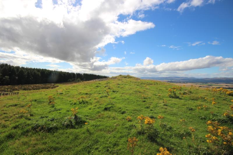 Cairn of Shiels, looking south, during daytime, on a clear day with blue sky