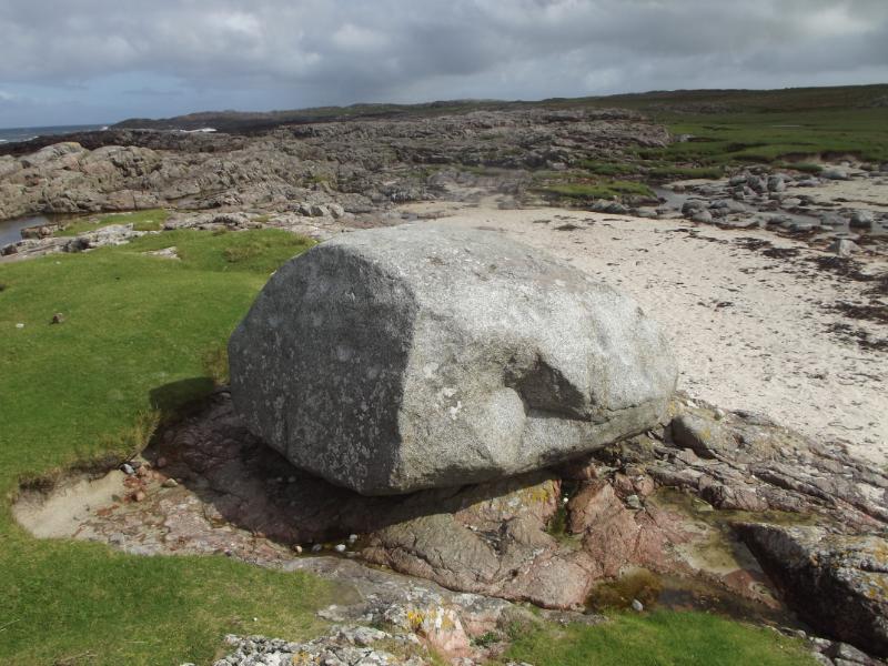 The Ringing Stone, looking east along the coast, during daytime.
