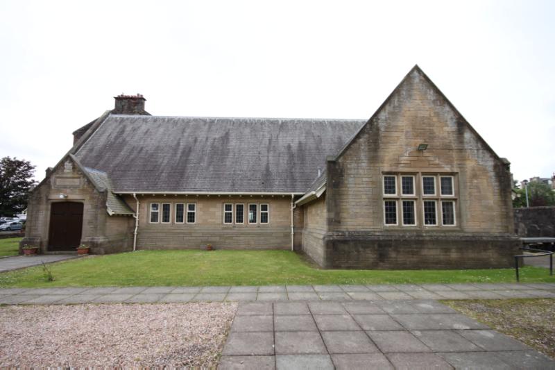 Exterior of church hall at Old West Kirk, Campbell Street, Greenock, looking southwest, during daytime on a cloudy day.