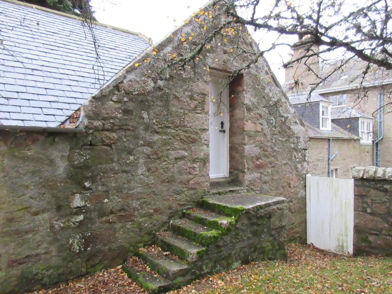 Former steading, Kirkton, southwest elevation, view of forestair, looking east during daytime, on a cloudy day.