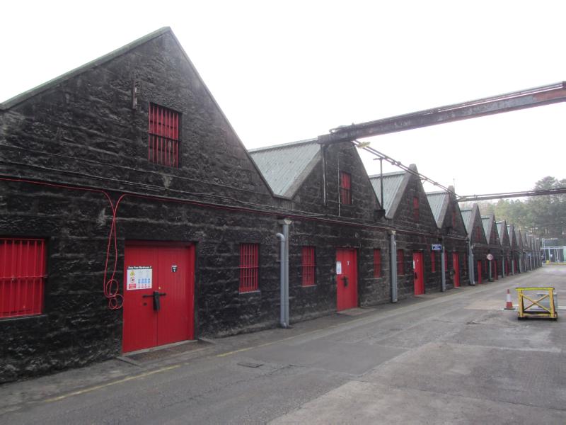 Bonded warehouses Ardmore Distillery, principal elevation, looking southwest, during daytime, on a cloudy day.