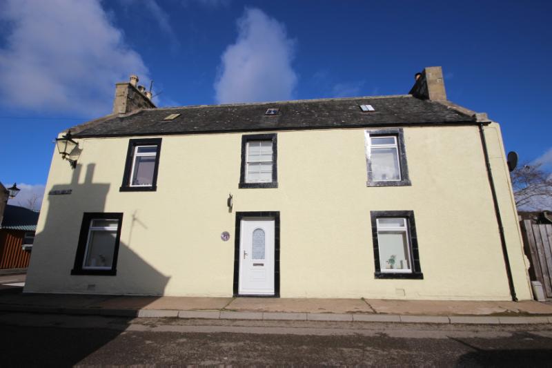 Feranich, Sutherland Street, Helmsdale, principal elevation, looking northeast. during daytime, on clear day with blue sky. 
