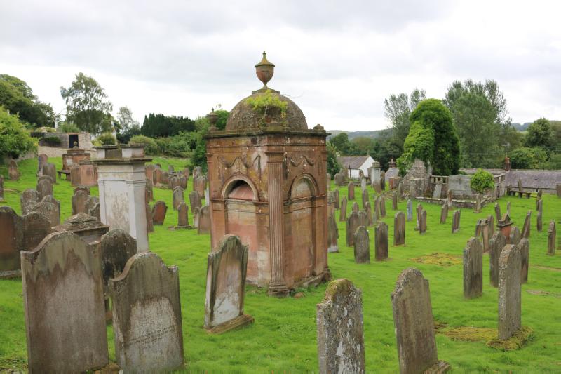 Graveyard, Glencairn Parish Church, Gillespie of Peelton Monument, looking south, during daytime, on a cloudy day. 