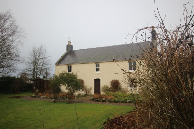Brigton Farmhouse, Douglastown principal elevation, looking south, during daytime, on clear day with blue sky. 