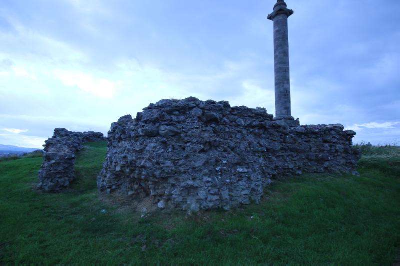 Remains of Elgin Castle, looking west, during daytime, on a clear day with cloudy sky