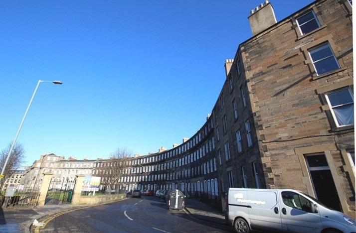 Elevation from southwest, 1-25A (Inclusive Numbers) Gardner’s Crescent and 109-115 (Odd Numbers) Morrison Street, Including Railings, Edinburgh, taken on clear day, van in foregournd.