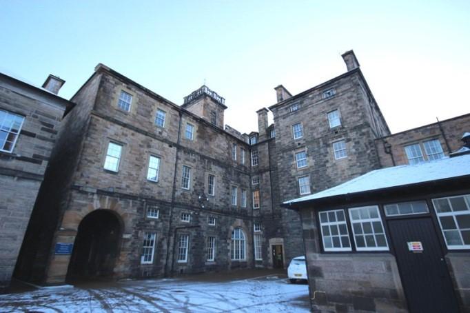 Southwest elevation, University of Edinburgh, Geography Department (Old Infirmary), Including Railings and Lamp Standards, 1 Drummond Street, Edinburgh