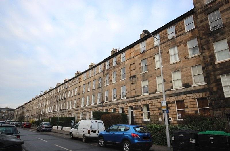 South elevation, 8-52 Rankeillor Street, Edinburgh, cars in foreground, taken on a cloudy day. 