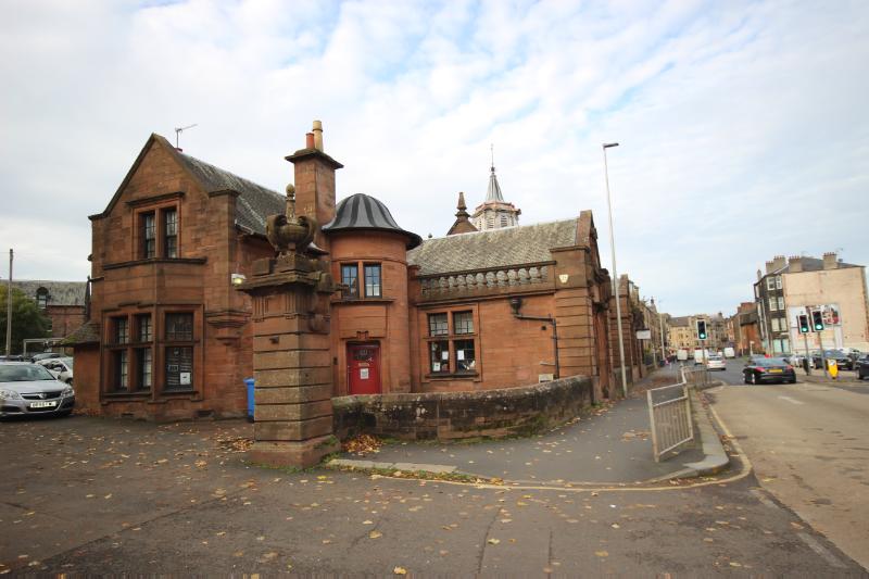 The Nursery Times, 22 Neilston Road, Paisley, southeast elevation, during daytime with blue and cloud sky.