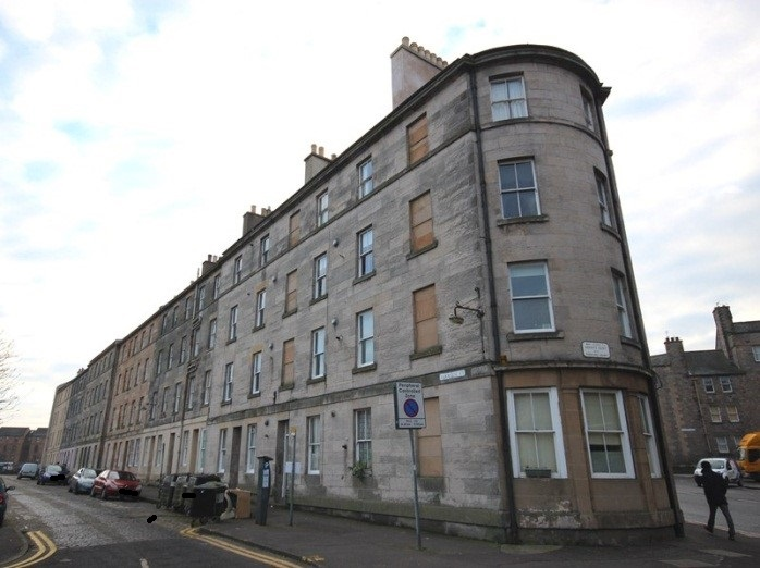 Northeast elevation, 2-14 (Inclusive Numbers) Parkside Street and 66-72 (Even Numbers) St Leonard’s Street, Edinburgh, on a cloudy day.