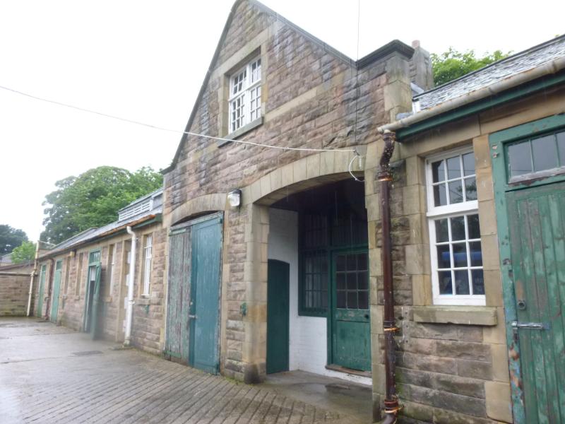 Stable block, Redford infantry barracks, Colinton Road, Edinburgh, southeast elevation, during daytime on cloudy day with grey sky. 