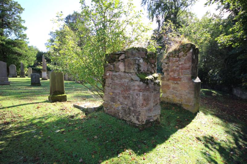 Remains of St Matthew's Chapel, looking southeast, during daytime, on a clear day with blue sky