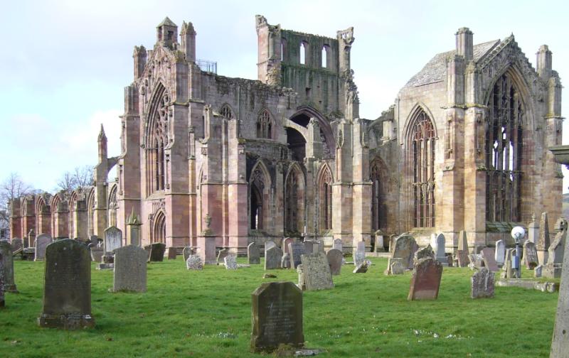 Melrose Abbey, looking northwest, on a clear day with blue sky