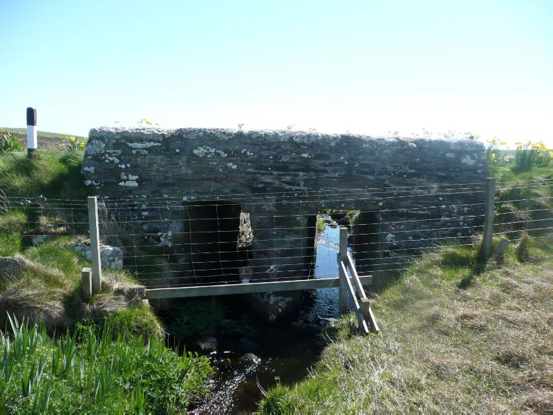 Troswick Clapper Bridge, Troswick, looking southeast on sunny day with blue sky.