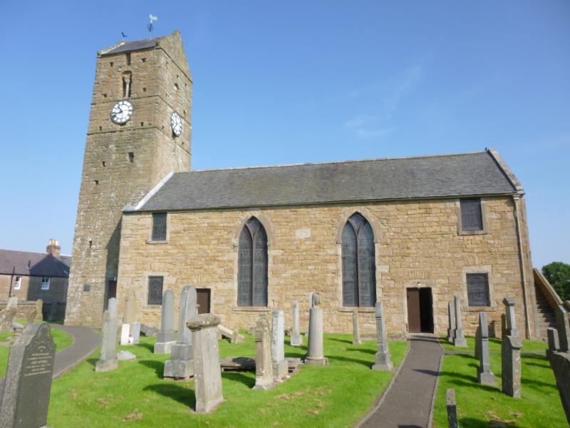 St Serf's Church, Dunning, looking north on a sunny day with blue sky.