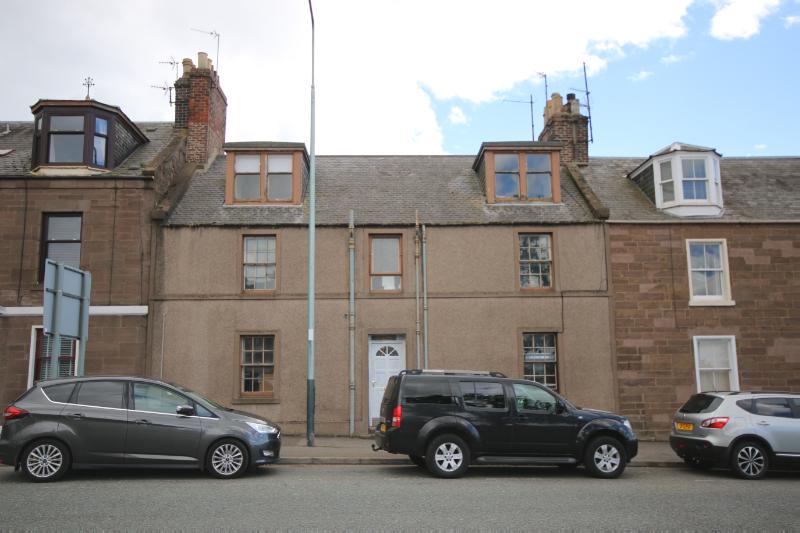 121 Bridge Street, Montrose, principal elevation, looking southeast, during daytime, on a cloudy day.
