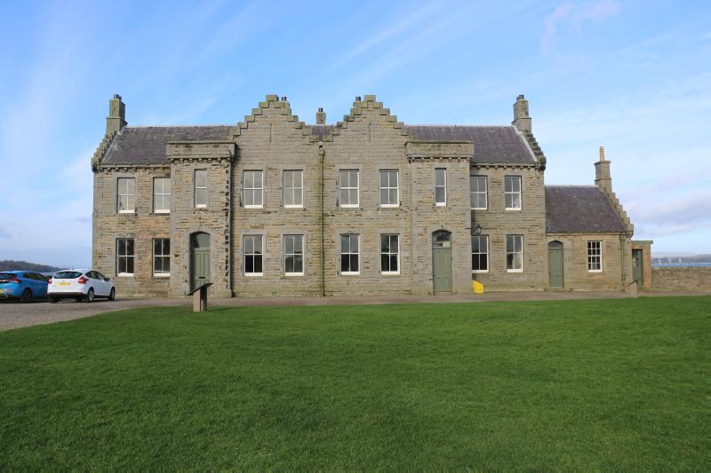 Blackness Castle, officer's quarters, principal elevation looking northwest on a clear day with blue sky.