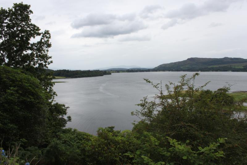 Achnacloich, looking west from viewpoint across Loch Etive, during daytime, on clear day with cloudy sky.