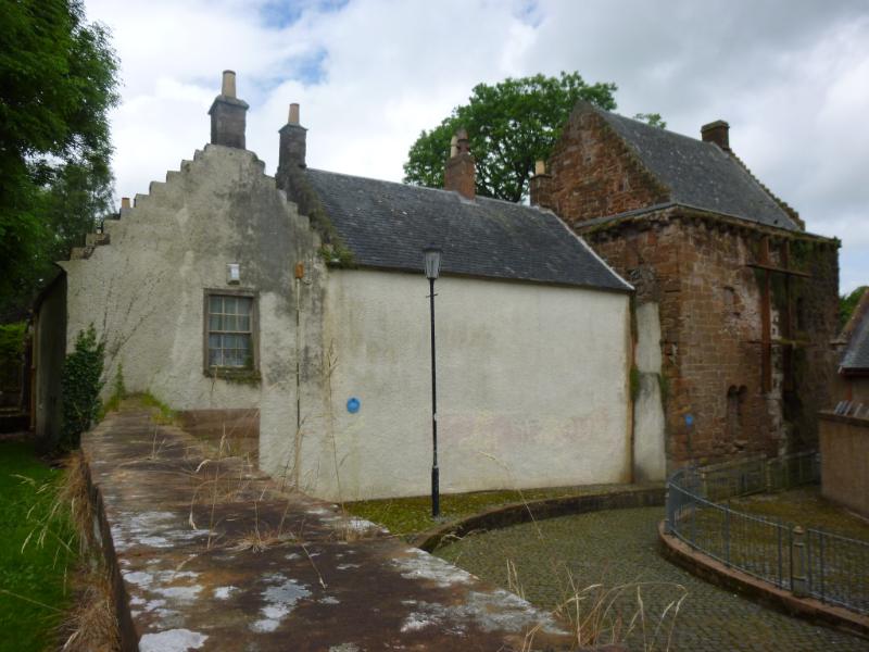 Gavin Hamilton's House, rear elevation and Mauchline Castle (LB14471), looking east, during daytime, on clear day with cloudy sky.