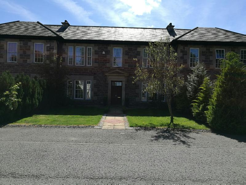 3, 4, 5 MacDougall Court (Former Administrative and Reception block, Perth District Asylum), principal elevation, looking south, during daytime.