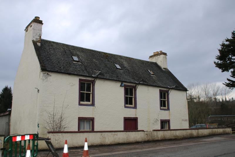 The Drouthy Duck front (northeast) elevation, looking west, during daytime, on overcast day with grey sky.