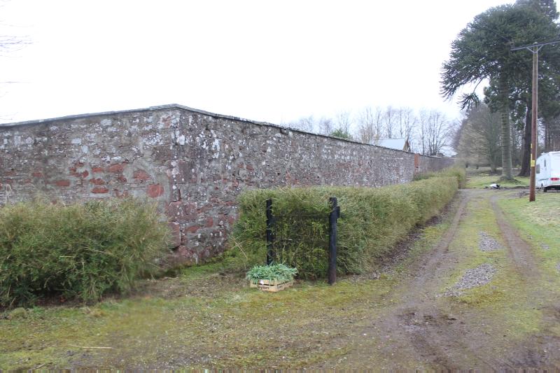 Noranside Walled Garden principal east elevation, looking north, during daytime, on rainy day. 