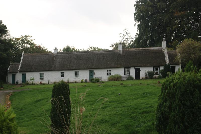  9 and 10 Swanston Village, main elevation, looking east on an overcast day.