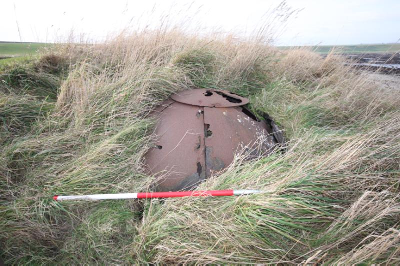 Crail Airfield, pillbox, detail of pillbox top, looking north, during daytime, on a dry day with partly clear sky.