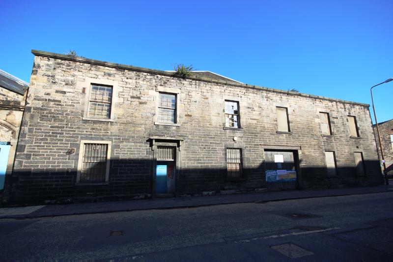 Former Edinburgh and Leith gasworks, Baltic Street elevation of west range, looking north, during daytime, on clear day with blue sky. 