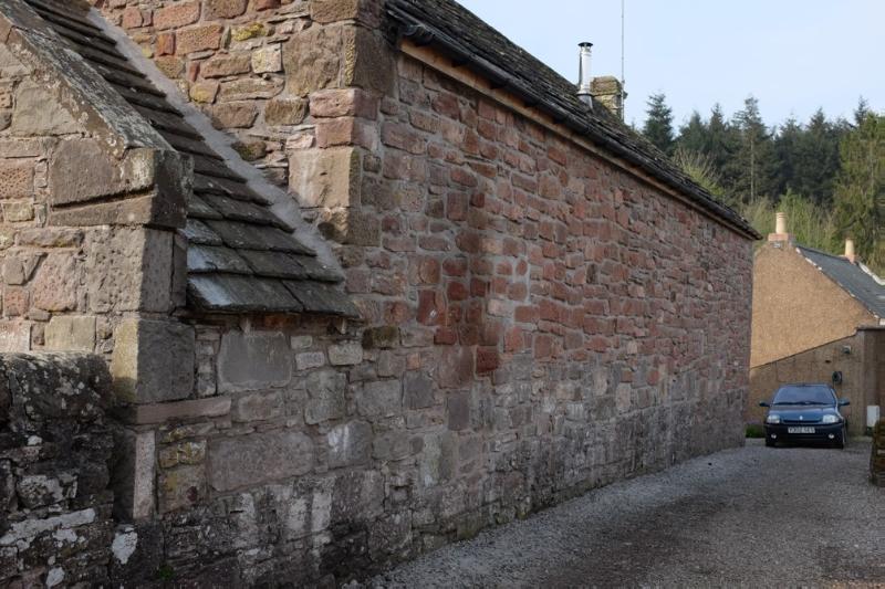 North elevation of former Shed-Garage, Channonry Wynd, Brechin, looking southwest, during daytime, on a clear day with blue sky. 