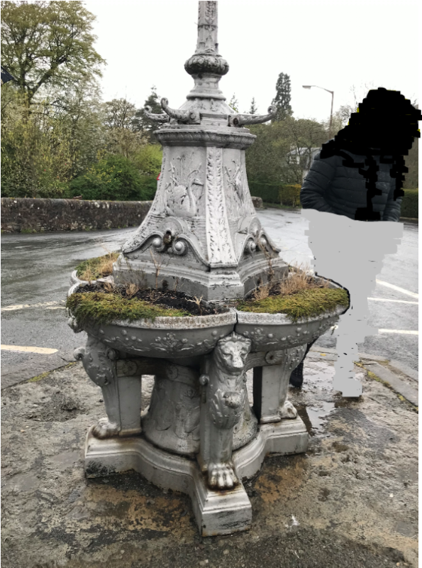 Fintry Fountain, detail of horse basins and base, during daytime on a grey day. 