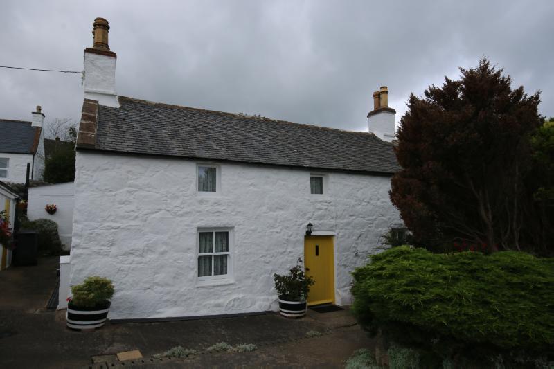 The Cottage, principal elevation, looking north on an overcast day.