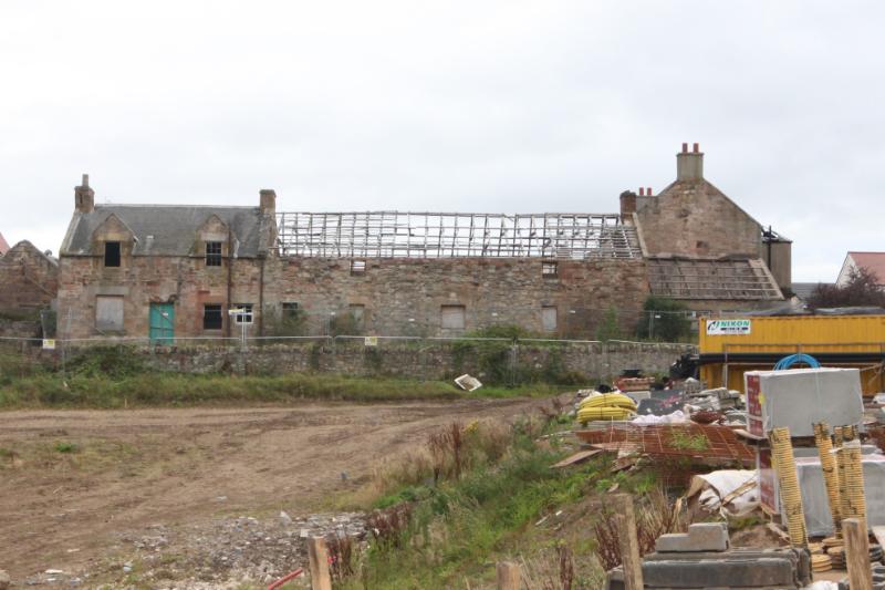 Cottage and West Range, Cockpen Farm principal elevation, looking east during daytime. 