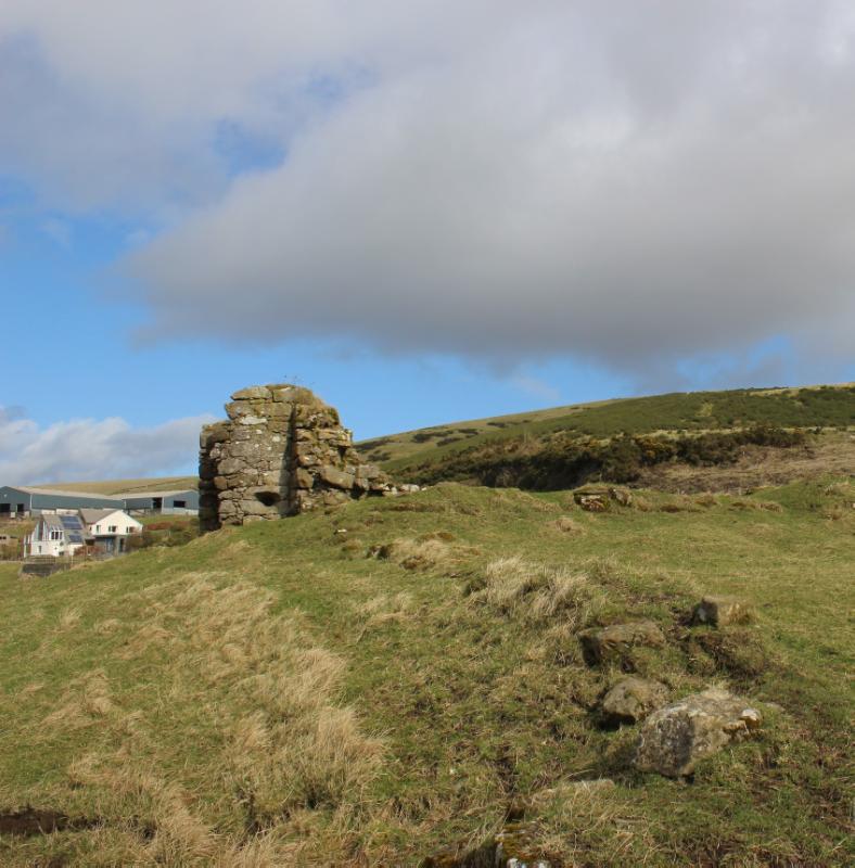 Killernie Castle, view from the courtyard to the tower house looking north during daytime, with blue sky and cloud. 