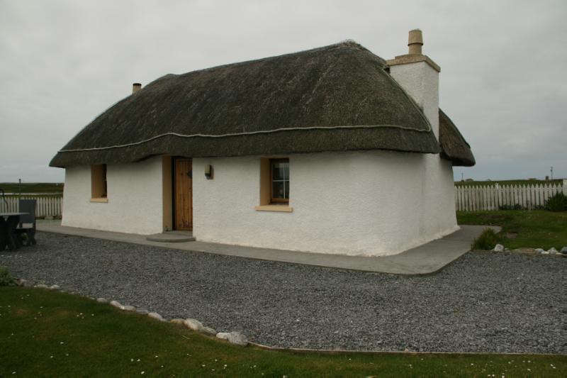 51 Balgarva, principal east elevation, looking southwest, during daytime. 