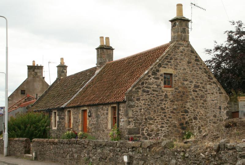 2 and 4 Newburgh Road, Auchtermuchty, looking south during daytime with cloudy sky.