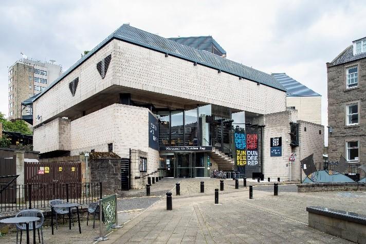 Dundee Repertory Theatre, principal elevation, looking northwest, during daytime, on clear day with cloudy blue sky. 
