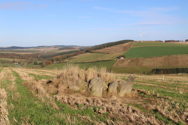 Four poster stone circle, 365m WSW of Raich Farm, looking north, during daytime, on clear day with blue sky.