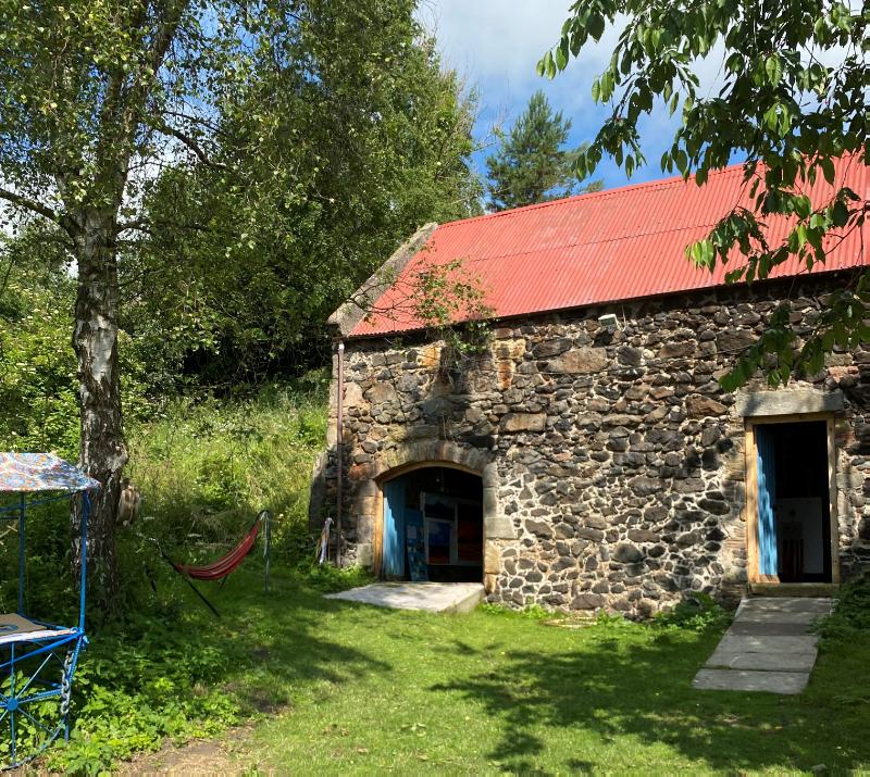 Craigencalt Mill, ‘The Hermitage’ or Old Corn Mill, principal elevation, looking south during daytime, on clear day with blue sky. 