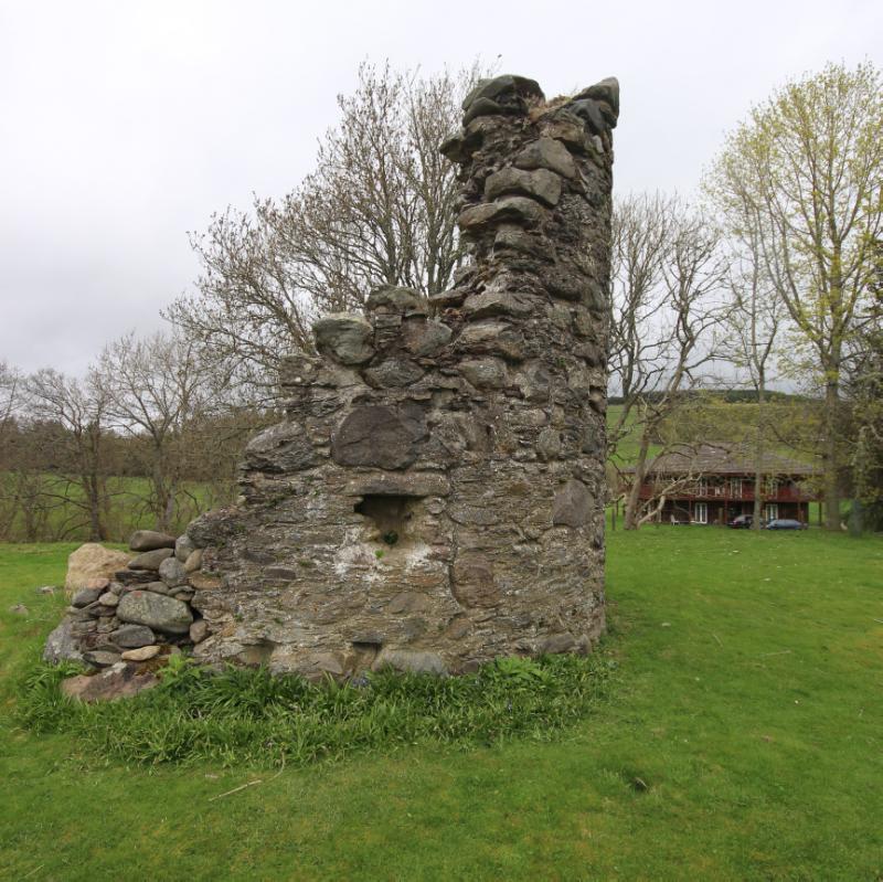 View of the standing, ruined, remains of Trochrie Castle looking north on an overcast day.