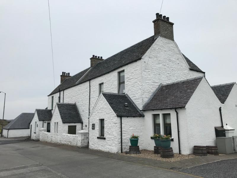 Ardbeg Distillery, old post office, former workers’ cottages, warehouse number two, old warehouse, Sea View and Excise House, viewed from northwest, looking to front elevation of Sea View and Excise House. 